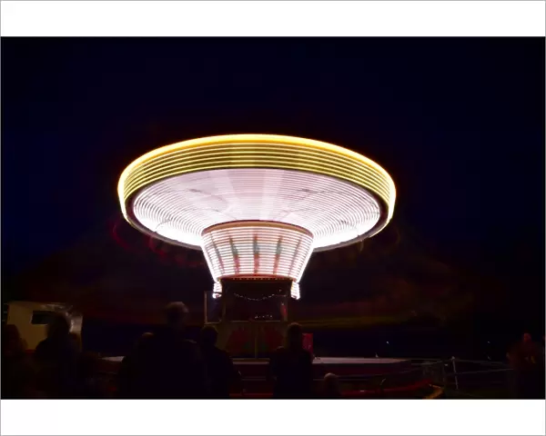 CM1 1970 Chair-o-planes at night