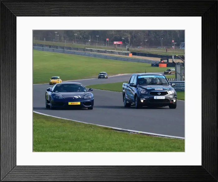 Framed Print : CM17 5771 Ssangyong overtakes Ferrari Framed Print : CM17 5771 Ssangyong overtakes Ferrari
