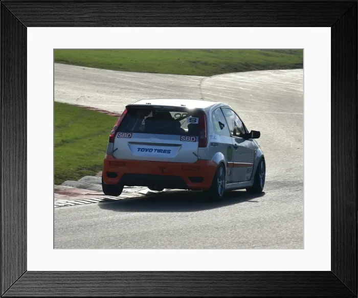 Framed Print : CM17 5782 Ford Fiesta hops the kerb at Surtees Framed Print : CM17 5782 Ford Fiesta hops the kerb at Surtees