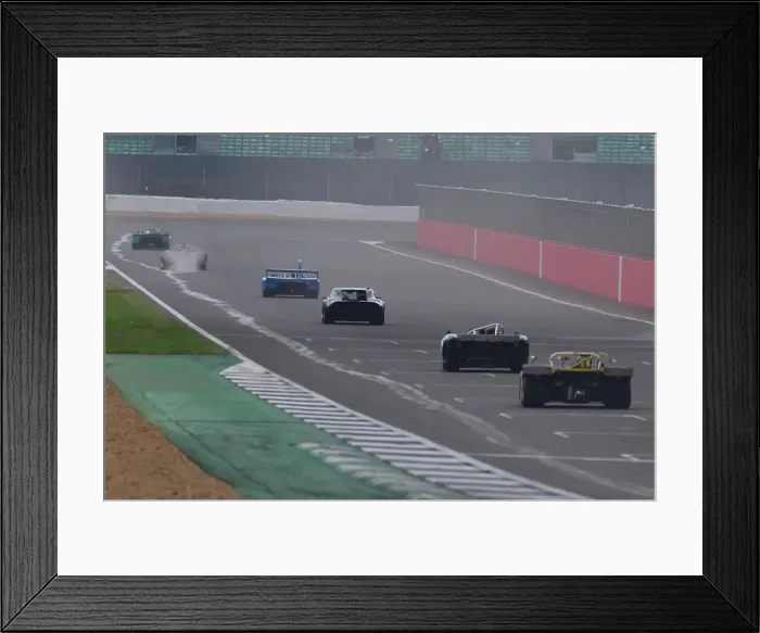 Framed Print : CJ11 0364 Racing down the straight