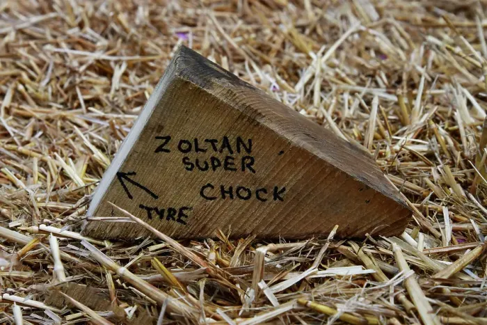 Rights Managed : CJ14 3260 Zoltan Super wheel chock with instructions Rights Managed : CJ14 3260 Zoltan Super wheel chock with instructions