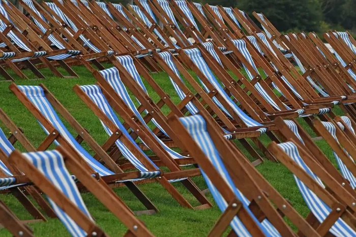 Rights Managed : CJ14 7832 Blue striped deck chairs