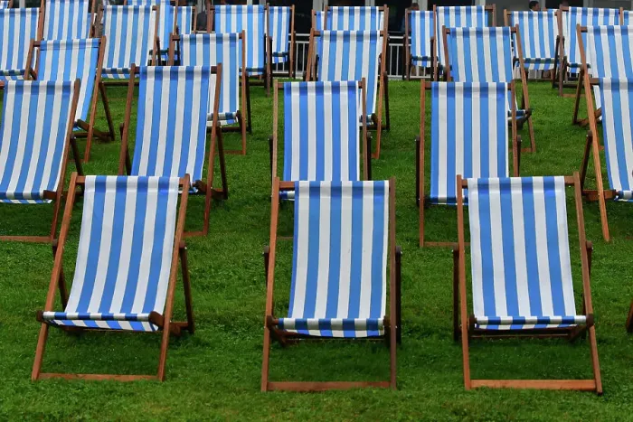 Rights Managed : CJ14 7960 Blue striped deck chairs Rights Managed : CJ14 7960 Blue striped deck chairs