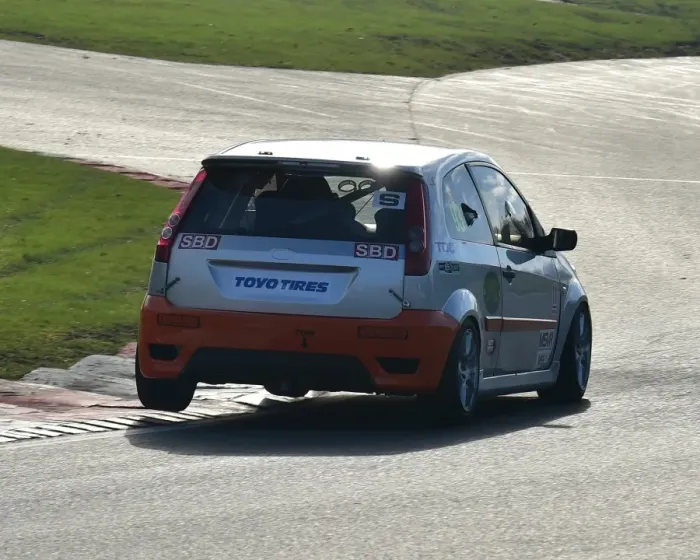 Framed Print : CM17 5782 Ford Fiesta hops the kerb at Surtees Framed Print : CM17 5782 Ford Fiesta hops the kerb at Surtees