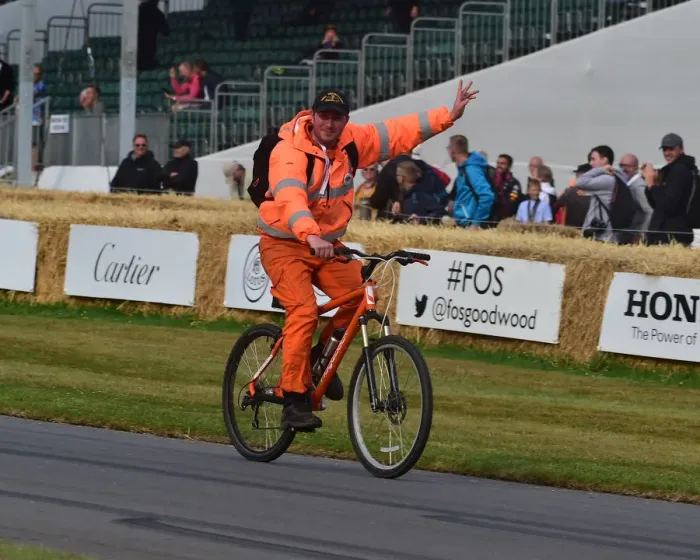 Rights Managed : CM29 0005 Thats all folks, Time to go home, marshal on a bicycle Rights Managed : CM29 0005 Thats all folks, Time to go home, marshal on a bicycle