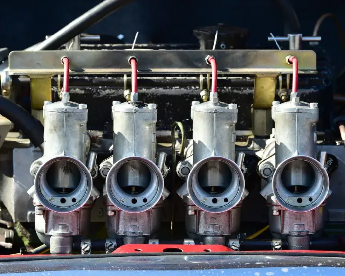 Rights Managed : CM29 5443 Quad Amal carburettors on a Mini Rights Managed : CM29 5443 Quad Amal carburettors on a Mini