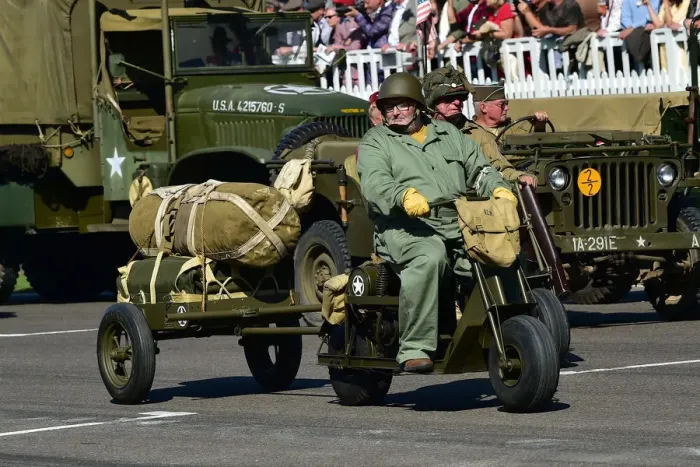 Rights Managed : CM29 5469 Cushman 53 Airbourne Scooter and trailer Rights Managed : CM29 5469 Cushman 53 Airbourne Scooter and trailer