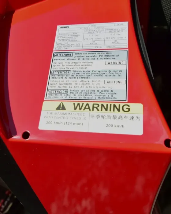 Rights Managed : CM3 4718 Winter tyres warning max 124mph Rights Managed : CM3 4718 Winter tyres warning max 124mph
