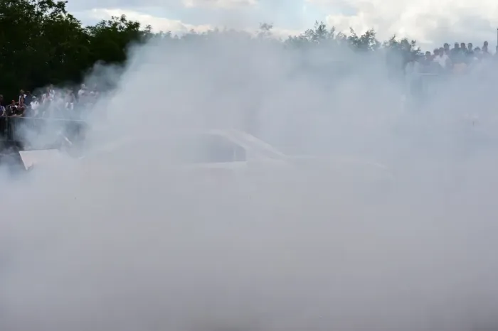 Rights Managed : CM3 4854 Max Papis, Chevrolet Impala, smoke, donuts Rights Managed : CM3 4854 Max Papis, Chevrolet Impala, smoke, donuts