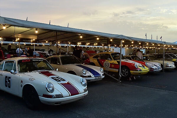 CM35 1782 A collection of Porsche 911's at dusk