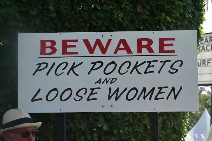 Rights Managed : CM35 2295 Pick Pockets and Loose Women warning sign Rights Managed : CM35 2295 Pick Pockets and Loose Women warning sign