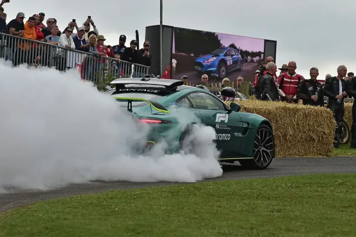 Rights Managed : CM36 0300 Aston Martin F1 Safety car letting off steam Rights Managed : CM36 0300 Aston Martin F1 Safety car letting off steam