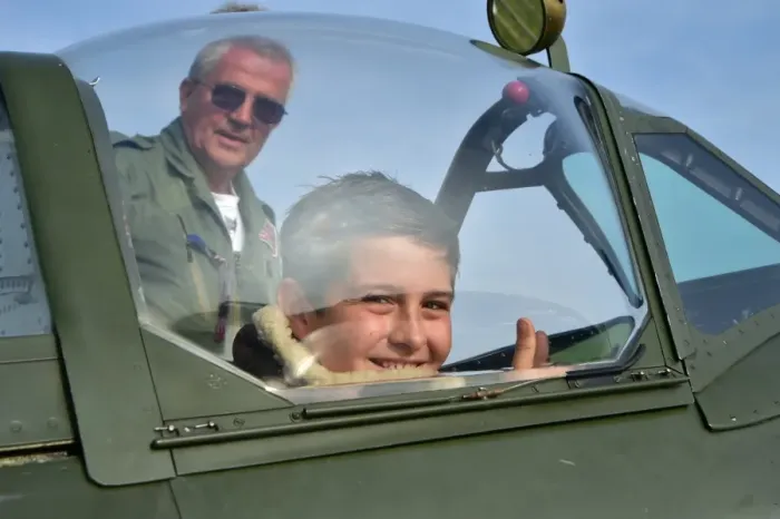 Rights Managed : CM5 0070 Spitfire, young pilot, big grin
