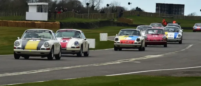 Rights Managed : CM6 4480 A host of Porsches approach Woodcote Rights Managed : CM6 4480 A host of Porsches approach Woodcote