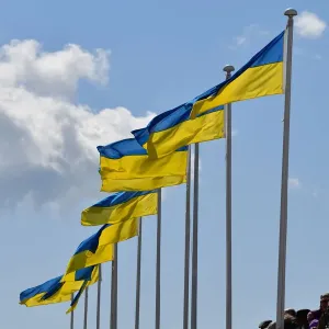 CJ10 5556 Ukrainian flags above the pits