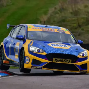 Print of Ash Sutton in his Ford Focus ST at the 2022 BTCC Launch Day