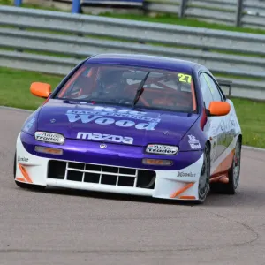 Print of a Mazda 323 in racing action Print of a Mazda 323 in racing action