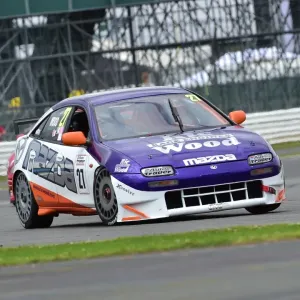 CM15 2322 Rick Wood, Mazda 323