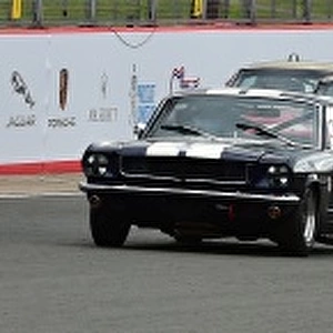 CM15 4241 Ford Mustangs lead the grid