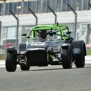Print of a Caterham Super Seven in racing action Print of a Caterham Super Seven in racing action