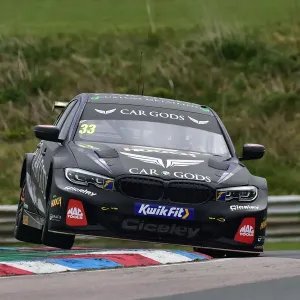 Print of Adam Morgan in his BMW 330e M Sport at Thruxton Circuit