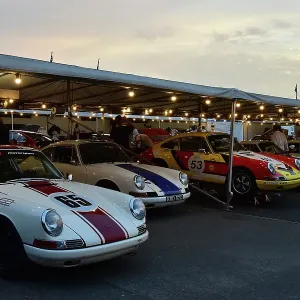 CM35 1782 A collection of Porsche 911's at dusk