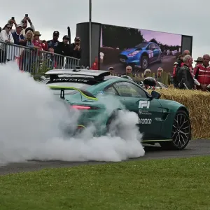 CM36 0300 Aston Martin F1 Safety car letting off steam CM36 0300 Aston Martin F1 Safety car letting off steam
