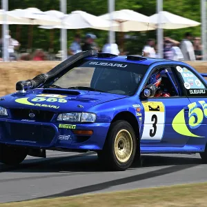 CZ3_1391 Max Girardo, Peter MacAlpine, Marcus Willis, Subaru Impreza WRC Safari.jpg CZ3_1391 Max Girardo, Peter MacAlpine, Marcus Willis, Subaru Impreza WRC Safari.jpg