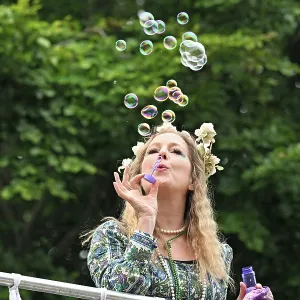 CZ4_8561 Hippie blonde girl blowing bubbles.jpg CZ4_8561 Hippie blonde girl blowing bubbles.jpg
