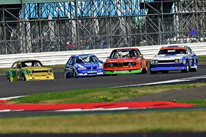 Prints of Fredric Wakeman, Patrick Blakeney-Edwards, BMW CSL, Four enter the loop, An impressive grid for the Tony Dron Memorial Trophy for MRL Historic Touring Cars The Classic Silverstone August 2022 Prints: CJ11 8242 Four enter the loop
