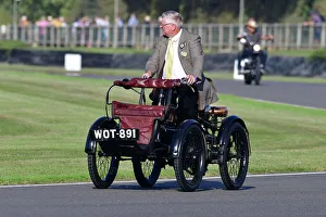 Prints of Royal Enfield Quadricycle, Track Parade - Motorcycle Celebration, circa 200 bikes featured in the morning parade laps, including sidecar outfits and motor trikes, BMW Motorrad completing a centenary Goodwood Revival 2023 Prints: CJ13 2147 Royal Enfield Quadricycle