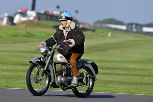 Prints of BSA Bantam, Track Parade - Motorcycle Celebration, circa 200 bikes featured in the morning parade laps, including sidecar outfits and motor trikes, BMW Motorrad completing a centenary Goodwood Revival 2023 Prints: CJ13 2152 BSA Bantam