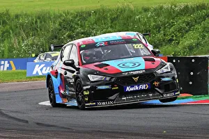 Prints of On three wheels, Chris Smiley, Cupra Leon, Restart Racing, BTCC, British Touring Car Championship, Rounds ten, eleven, and twelve of the 2024 season, from the Thruxton Circuit, Andover, Hampshire BTCC Thruxton June 2024 Prints: CJ14 0647 Chris Smiley, Cupra Leon, Restart Racing