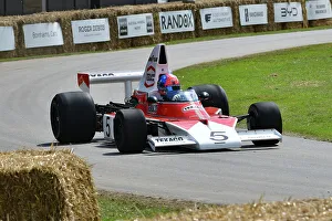 The Formula 1 Teams Prints: CJ14 2717 Emerson Fittipaldi, McLaren-Cosworth M23-5