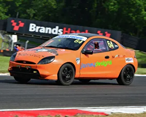 <b class=qtipBold><figcaption>CJ7 3626 Adrian Matthews, Ford Puma</figcaption></b><br>Adrian Matthews, Ford Puma, SpeedFest Saloons, American Speedfest VI, Brands Hatch, June 2018, automobiles, Autosport, cars, circuit racing, England, entertainment, European, June 2018, Kent, motor racing, motor sport, motorracing, racing, track racing, nostalgia, classic cars, historic cars, sports cars,<br><em>© 2018 Chris McEvoy, www.cjm-photography.co.uk, all rights reserved</em> CJ7 3626 Adrian Matthews, Ford Puma