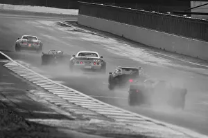 Prints of Five cars leaving a long trail of spray down the Hamilton straight, Peter Hallford, Chevrolet Corvette, Thundersports, Historic Sports Car Club, HSCC, International Trophy Meeting International Trophy Meeting, Silverstone Grand Prix Circuit Prints: CJM-P 0459b w r Red rain lights show the way down the Hamilton Straight