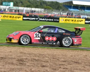 <b class=qtipBold><figcaption>CM21 4215 Dan McKay, Porsche 911 GT3</figcaption></b><br>Dan McKay, Porsche 911 GT3, Porsche Carrera Cup Great Britain 2017, BTCC Silverstone, Sunday, 17th September, 2017, Autosport, British Touring Car Championship, England, motor sport, Northamptonshire, racing circuit racing, UK, Northamptonshire, racing cars, sports cars, vehicles, racing, saloon cars, competition, circuit racing,<br><em>© 2017 Chris McEvoy, www.cjm-photography.co.uk, all rights reserved</em> CM21 4215 Dan McKay, Porsche 911 GT3