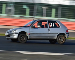 <b class=qtipBold><figcaption>CM22 4279 Harry Painter, Peugeot 106</figcaption></b><br>Harry Painter, Peugeot 106, VSCC, Pomeroy Trophy, Silverstone, 24th February 2018, 2018, cars, Chris McEvoy, cjm-photography, competition, February, Fun, historic cars, iconic, motor sport, motorsport, nostalgia, outdoors, Pomeroy trophy, pre-war, retro, saloon cars, Silverstone, sports, sports cars, tests, trials, vintage cars, Vintage Sports Car Club, VSCC<br><em>© 2018 www.cjm-photography.co.uk,all rights reserved</em> CM22 4279 Harry Painter, Peugeot 106