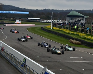 <b class=qtipBold><figcaption>CM22 5998 Lining up for the grid</figcaption></b><br>Lining up for the grid, Formula 3, Derek Bell Cup, 76th Members Meeting, Goodwood, England, March 2018, Sussex, Autosport, cars, circuit racing, classic cars, competition, England, fast, Fun, Goodwood, historic cars, leisure activity, Live Action, March 2018, motor sport, nostalgia, outdoors, outside, performance cars, racing, racing cars, retro, speed, UK, vehicles, West Sussex<br><em>© 2018 Chris McEvoy, www.cjm-photography.co.uk, all rights reserved</em> CM22 5998 Lining up for the grid