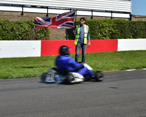 Karting Prints: CM23 3852 Brian Malin, waves off karts at start of demonstration session