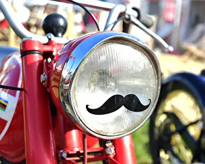 September 2018 Prints: CM25 5237 Motorcycle headlamp with a moustache