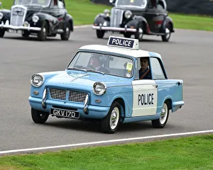 <b class=qtipBold><figcaption>CM25 6784 Triumph Herald Police Car</figcaption></b><br>Triumph Herald Police Car, British Transport Parade, Goodwood Revival 2018, September 2018, automobiles, cars, circuit racing, Classic, competition, England, entertainment, event, Goodwood, heritage, historic, Duke of Richmond, motor sport, motorcars, nostalgia, outdoors, racing, racing cars, retro, revival, September, speed, sport, sports, Sussex, West Sussex, vehicles, cars, racing, classic cars, historic cars,<br><em>© 2018 Chris McEvoy, www.cjm-photography.co.uk, all rights reserved</em> CM25 6784 Triumph Herald Police Car