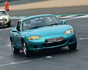 <b class=qtipBold><figcaption>CM26 6327 Dennis Bingham, Mazda MX-5</figcaption></b><br>Dennis Bingham, Mazda MX-5, VSCC, Pomeroy Trophy, Silverstone, 16th February 2019, cars, competition, February, Fun, historic cars, iconic, motor sport, motorsport, nostalgia, outdoors, Pomeroy trophy, pre-war, retro, saloon cars, Silverstone, sports, sports cars, tests, trials, vintage cars, Vintage Sports Car Club, fast, speed, competition, cars, vehicles,<br><em>© 2019 Chris McEvoy, www.cjm-photography.co.uk, all rights reserved</em> CM26 6327 Dennis Bingham, Mazda MX-5