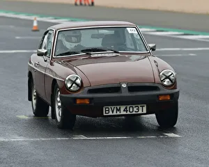 <b class=qtipBold><figcaption>CM26 6332 James Painter, MGB GT</figcaption></b><br>James Painter, MGB GT, VSCC, Pomeroy Trophy, Silverstone, 16th February 2019, cars, competition, February, Fun, historic cars, iconic, motor sport, motorsport, nostalgia, outdoors, Pomeroy trophy, pre-war, retro, saloon cars, Silverstone, sports, sports cars, tests, trials, vintage cars, Vintage Sports Car Club, fast, speed, competition, cars, vehicles,<br><em>© 2019 Chris McEvoy, www.cjm-photography.co.uk, all rights reserved</em> CM26 6332 James Painter, MGB GT