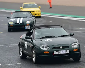 <b class=qtipBold><figcaption>CM26 6417 Rob Hubbard, MG F Type</figcaption></b><br>Rob Hubbard, MG F Type, VSCC, Pomeroy Trophy, Silverstone, 16th February 2019, cars, competition, February, Fun, historic cars, iconic, motor sport, motorsport, nostalgia, outdoors, Pomeroy trophy, pre-war, retro, saloon cars, Silverstone, sports, sports cars, tests, trials, vintage cars, Vintage Sports Car Club, fast, speed, competition, cars, vehicles,<br><em>© 2019 Chris McEvoy, www.cjm-photography.co.uk, all rights reserved</em> CM26 6417 Rob Hubbard, MG F Type