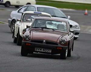 <b class=qtipBold><figcaption>CM26 6731 James Painter, MGB GT</figcaption></b><br>James Painter, MGB GT, VSCC, Pomeroy Trophy, Silverstone, 16th February 2019, cars, competition, February, Fun, historic cars, iconic, motor sport, motorsport, nostalgia, outdoors, Pomeroy trophy, pre-war, retro, saloon cars, Silverstone, sports, sports cars, tests, trials, vintage cars, Vintage Sports Car Club, fast, speed, competition, cars, vehicles,<br><em>© 2019 Chris McEvoy, www.cjm-photography.co.uk, all rights reserved</em> CM26 6731 James Painter, MGB GT
