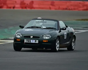 <b class=qtipBold><figcaption>CM26 6993 Rob Hubbard, MG F Type</figcaption></b><br>Rob Hubbard, MG F Type, VSCC, Pomeroy Trophy, Silverstone, 16th February 2019, cars, competition, February, Fun, historic cars, iconic, motor sport, motorsport, nostalgia, outdoors, Pomeroy trophy, pre-war, retro, saloon cars, Silverstone, sports, sports cars, tests, trials, vintage cars, Vintage Sports Car Club, fast, speed, competition, cars, vehicles,<br><em>© 2019 Chris McEvoy, www.cjm-photography.co.uk, all rights reserved</em> CM26 6993 Rob Hubbard, MG F Type
