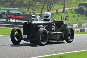 Prints of George Scholey, Austin 7 Ulster, Under 30s Scratch Race, 15 minute race, for drivers in the youth section, in an own car a family one or one loaner for the event by a generous member The Vintage Sports Car Club, Seaman And Len Thompson Trophies Race Meeting, Cadwell Park Circuit, Louth, Lincolnshire, England, June, 2022 Prints: CM32 9444 George Scholey, Austin 7 Ulster