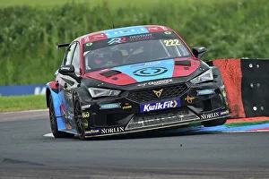 Prints of Lifting an inside front wheel, Chris Smiley, Cupra Leon, Restart Racing, BTCC, British Touring Car Championship, Rounds ten, eleven, and twelve of the 2024 season, from the Thruxton Circuit, Andover BTCC Thruxton June 2024 Prints: CM34 8319 Chris Smiley, Cupra Leon, Restart Racing