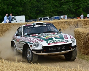 <b class=qtipBold><figcaption>CM8 6576 Steven Smith, Datsun 260Z</figcaption></b><br>Steven Smith, Datsun 260Z, Forest Rally stage, Goodwood FoS 2015, 2015, Classic, Datsun 260Z, entertainment, fearless, Festival of Speed, Flat out, forest, FoS, Goodwood, Goodwood FoS 2015, Goodwood MMS 2015, heritage, hill climb, June, MMS, motor sport, Moving Motor Show, nostalgia, racing on the edge, Rally, rally cars, rallying, stage, Steven Smith, West Sussex<br><em>© © CJM-Photography.co.uk, 2015. All Rights Reserved. Chris McEvoy.</em> CM8 6576 Steven Smith, Datsun 260Z